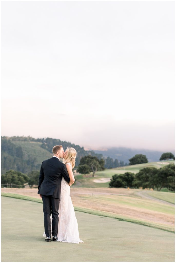 Bride and groom kissing at sunset at Tehama Golf Club