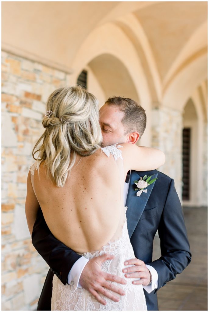 Bride and groom sharing a kiss after their "first look" at Tehama Golf Club