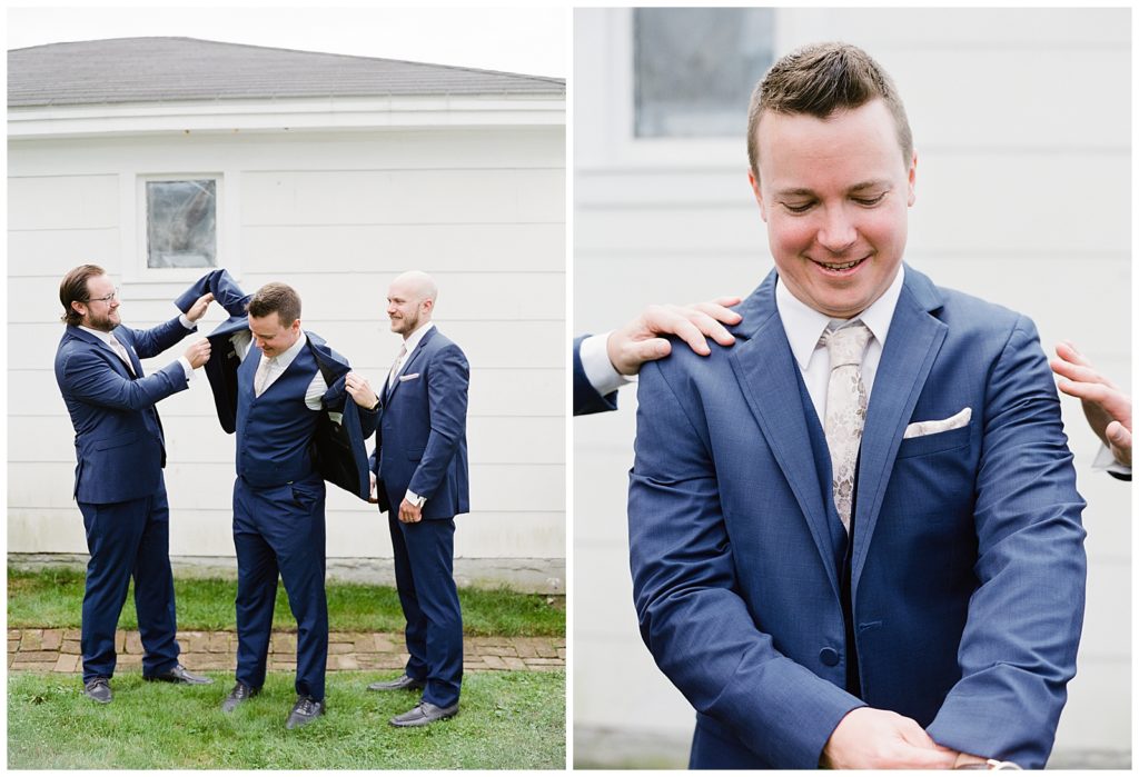 groom-getting-ready-film-suite-jacket