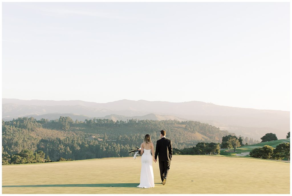 couple hand in hand on the day of their Black Tie Wedding At Tehama taking in the sweeping view by film photographer AGS Photo Art