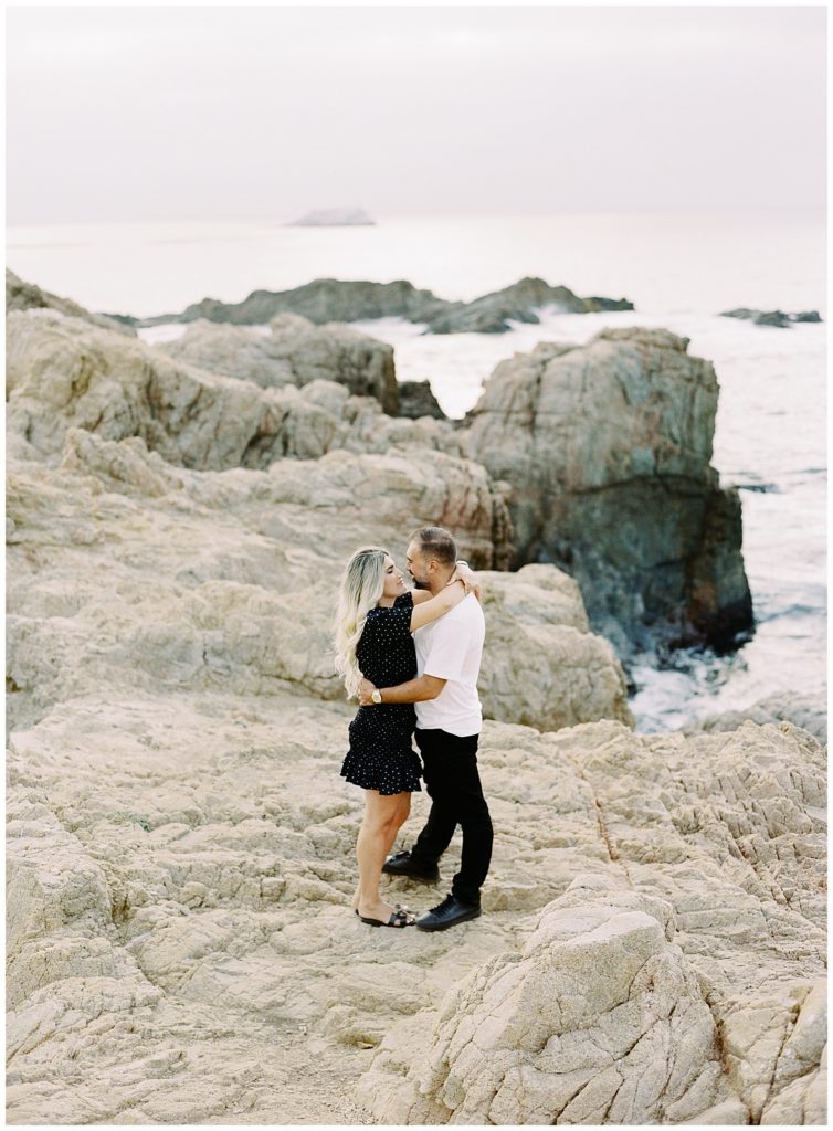 couple portrait on the cliffs of Big Sur for a 10-year anniversary session