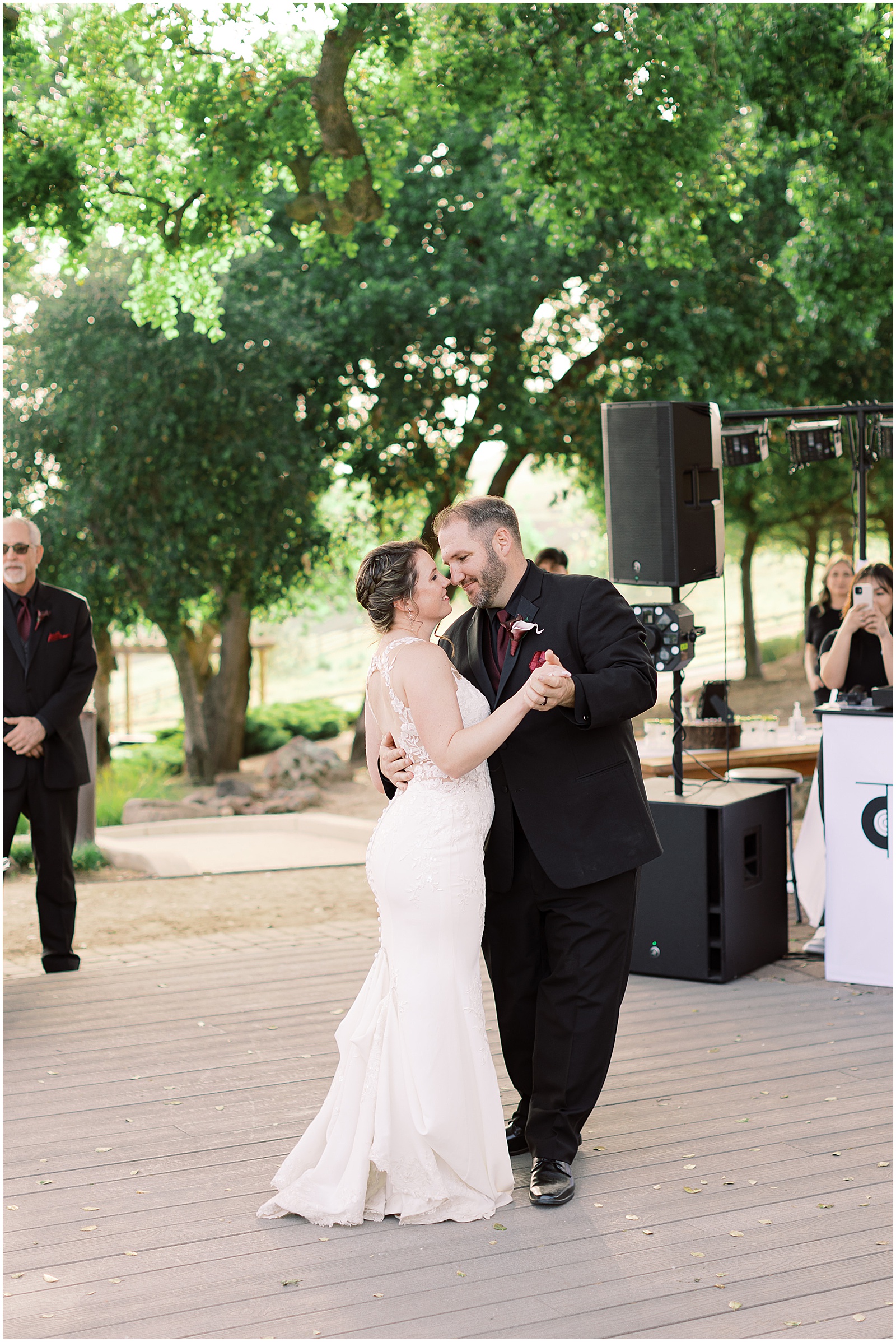 portrait of the bride and groom dancing together