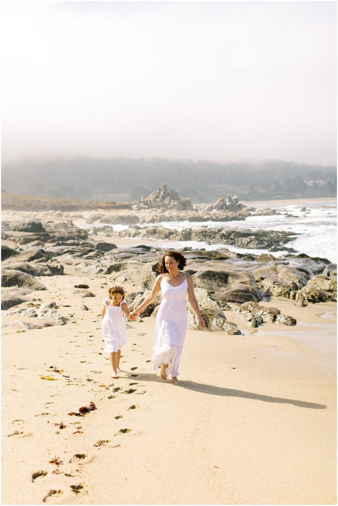 portrait of mother and daughter holding hands on beach by film photographer AGS Photo Art
