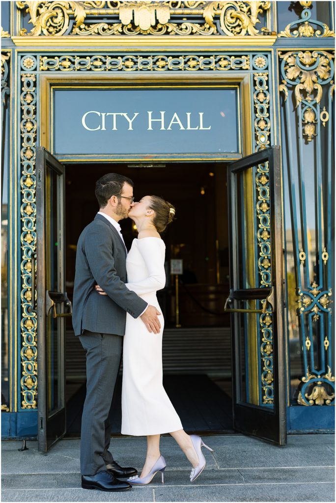 portrait of couple standing outside of city hall by film photographer AGS Photo Art