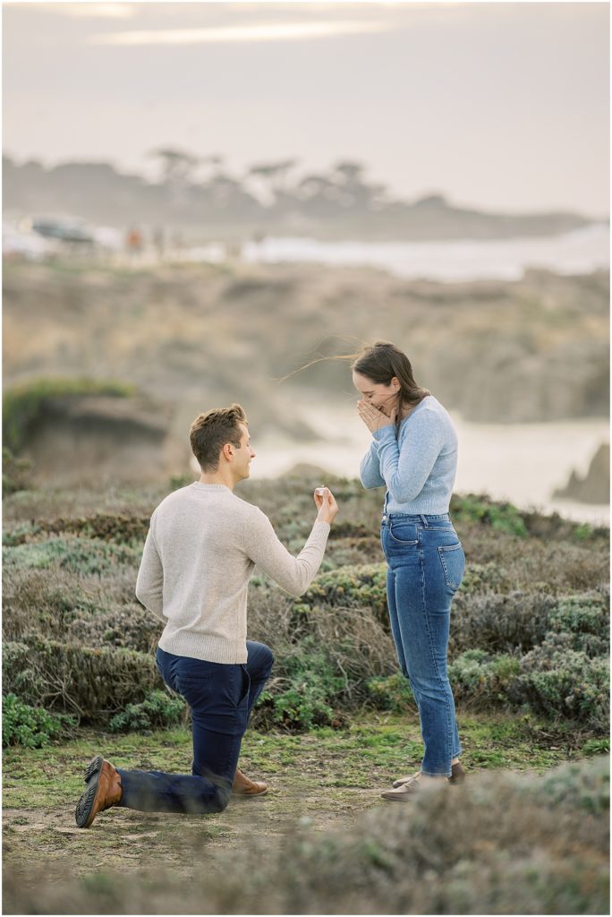 portrait of man kneeling to propose with ring in hand by film photographer AGS Photo Art