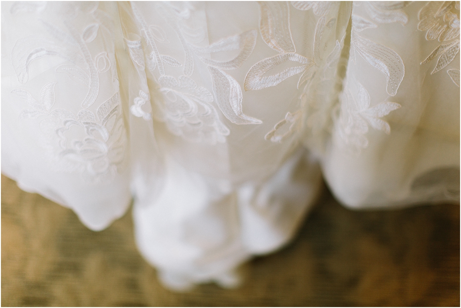 wedding dress details, lace ivory in color the edges of the gown