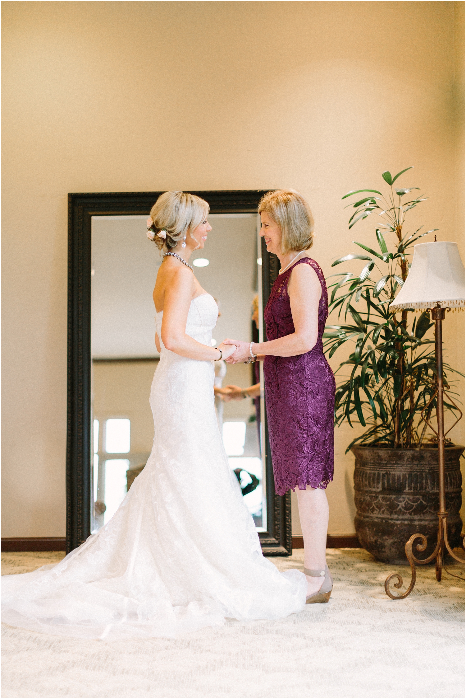 intimate moment with mother of bride with bride
