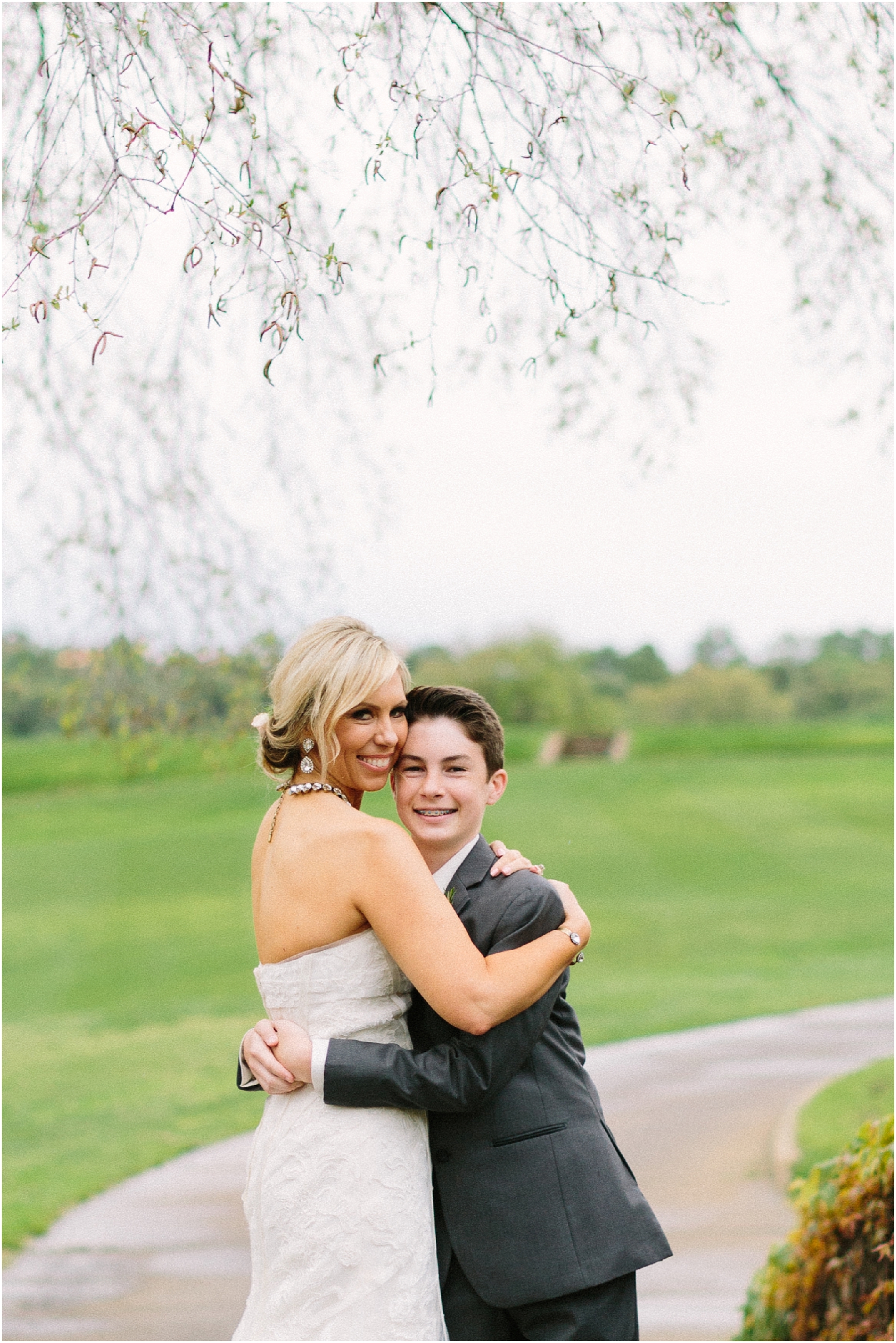 Mother and son hugging on wedding day 