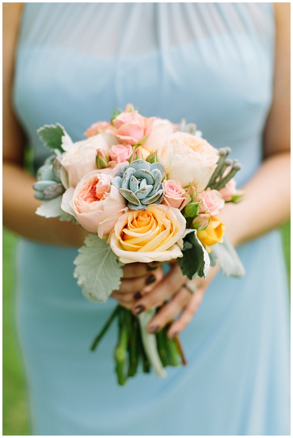 Succulent and peach bouquet dusty blue bridesmaid dress