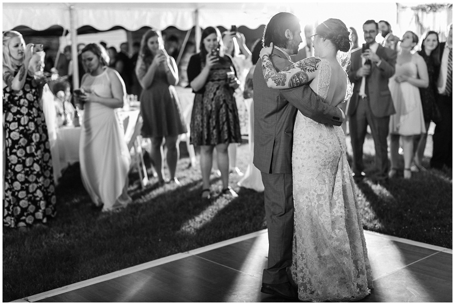Unique wedding in the Poconos; black and white bride and groom first dance 