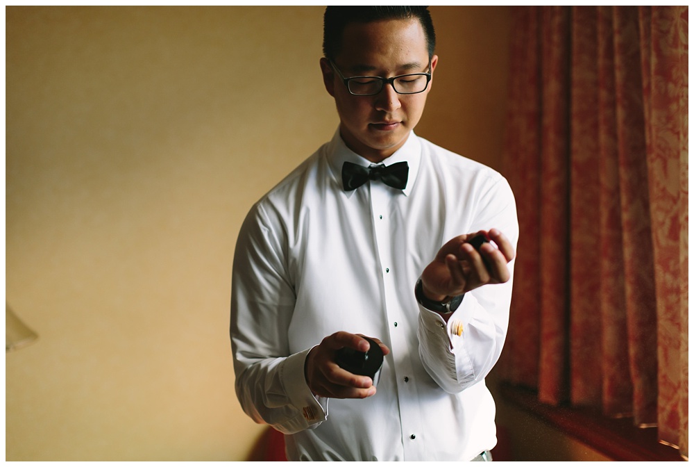 Groom getting ready on his wedding day at the Pomme in Radnor