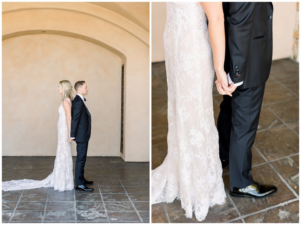 Bride and groom holding hands back-to-back before their first look