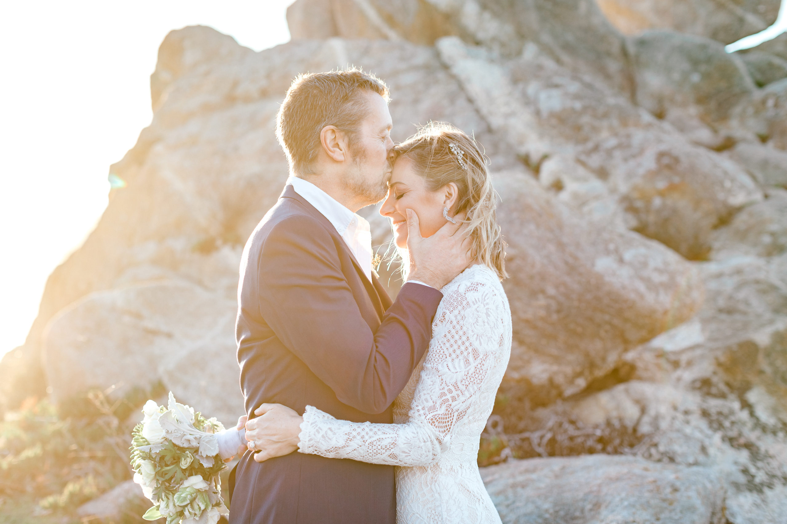 elopement by the sea sunset kiss photo by AGS Photo Art
