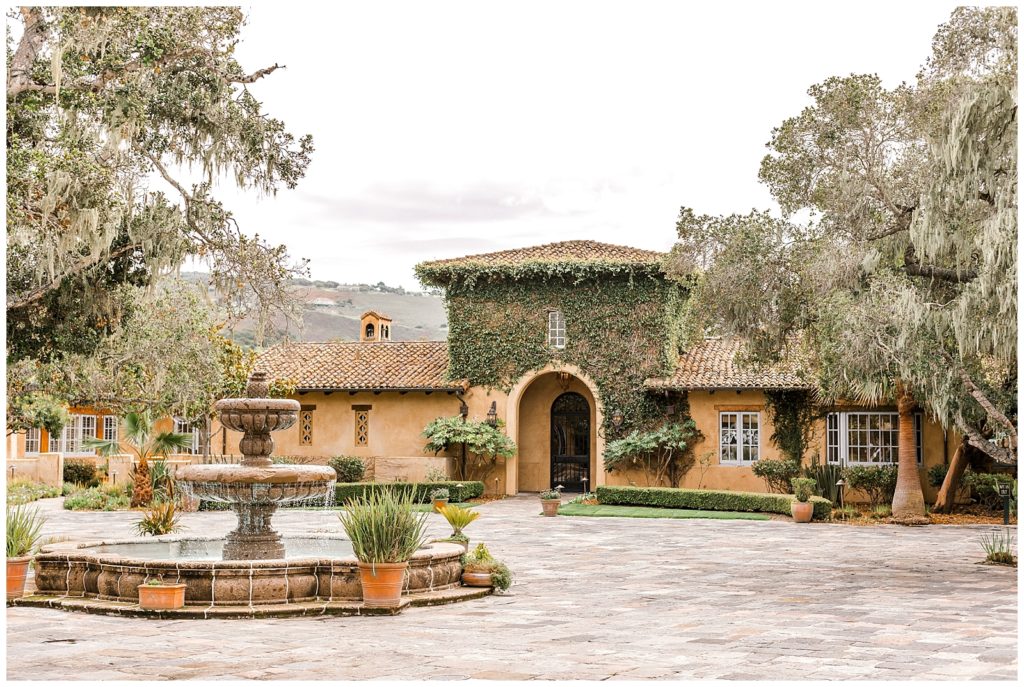 The Club at Pasadera Monterey wedding venue with Spanish style architecture and fountain