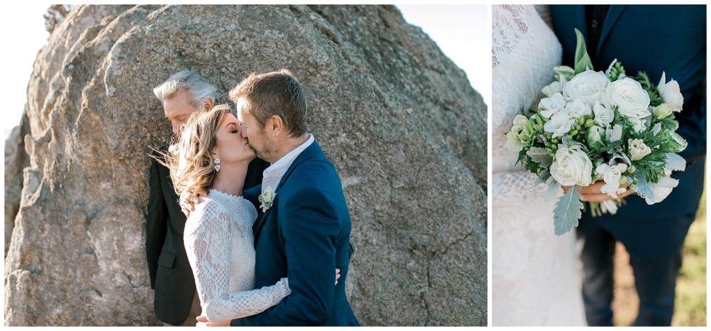 Wedding rock ceremony kiss with bouquet of white ranunculus flowers