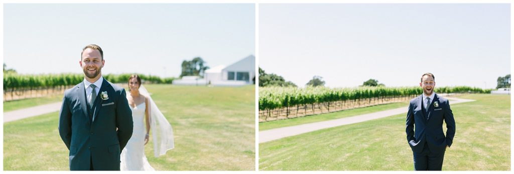 Excited groom waits to see his bride at a California vineyard