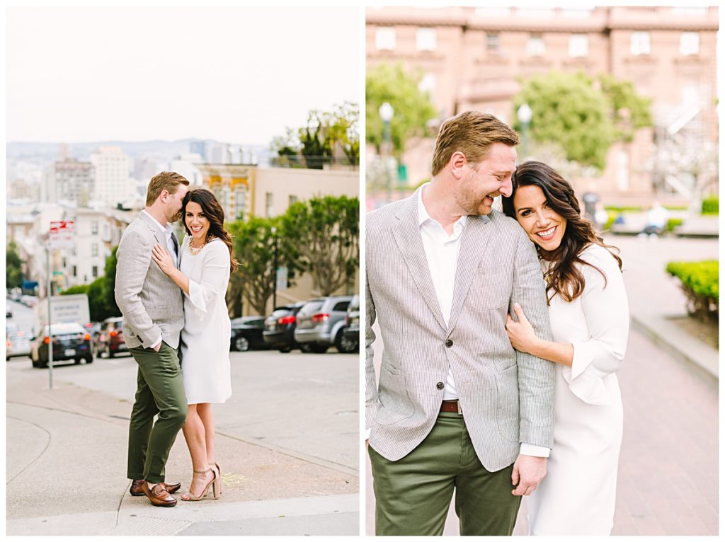 Cute couple in white dress and grey blazer smiling on the streets of San Francisco