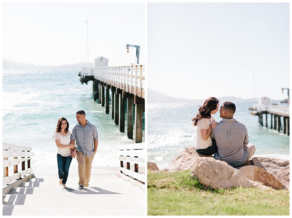 interracial couple walking at beach near pier in Carmel, CA