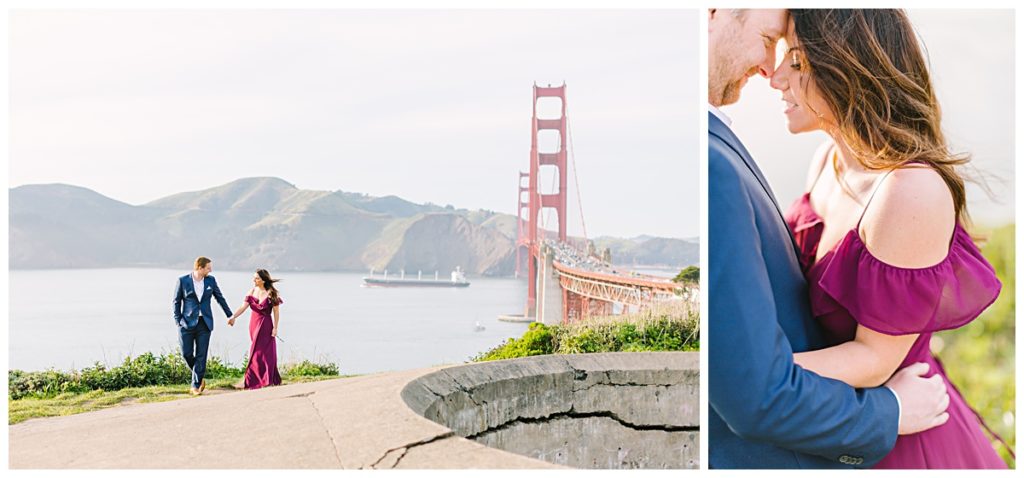 Woman in pink dress and man in blue suit take engagement photos in front of the Golden Gate Bridge in San Francisco, CA