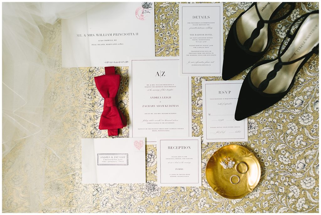 Bride and groom accessories with invitation gold and black
