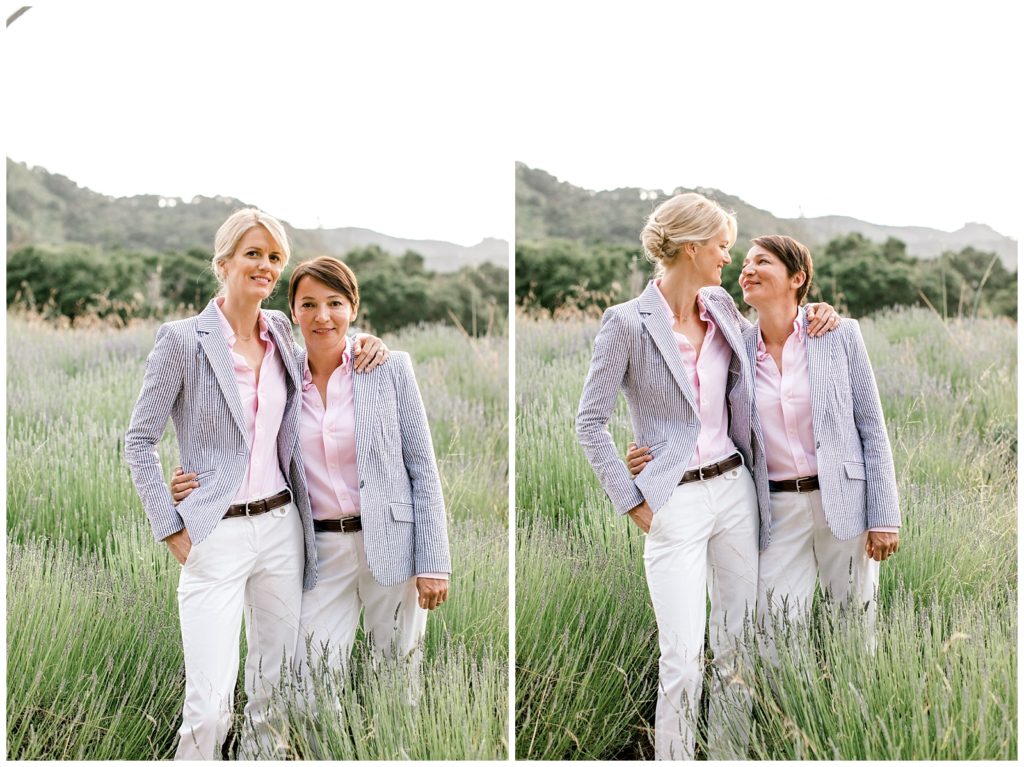couple standingtogether in a tall grassy field