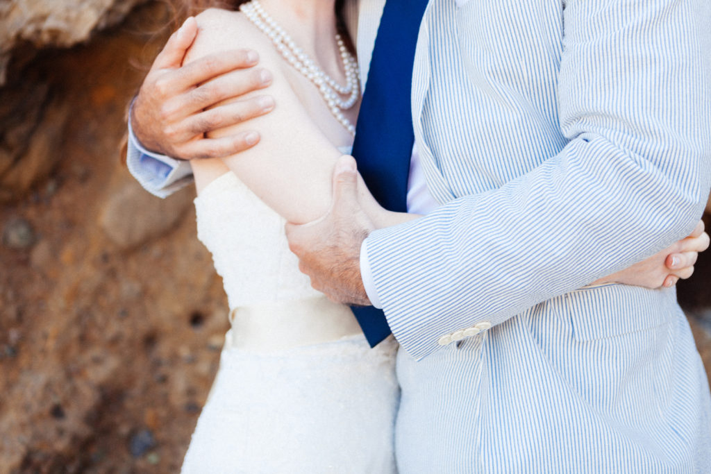 bride and groom hugging at Pfeiffer Beach Film Image
