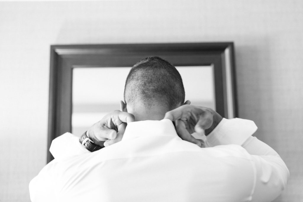 groom-getting-ready-black-and-white