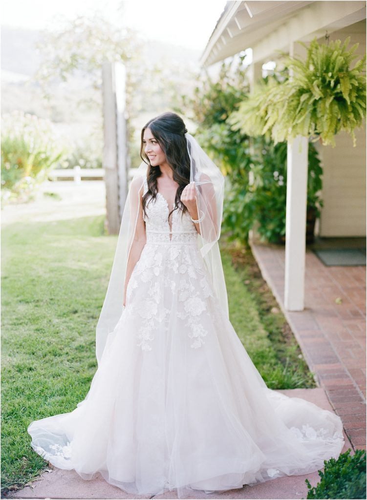 romantic bridal portrait outdoor scenery at Mission Ranch green backdrop