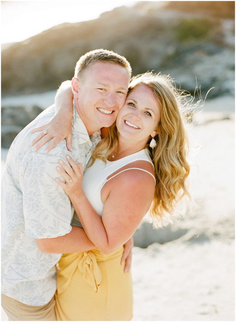 sun drenched couple on Carmel Beach proposal images by AGS Photo Art