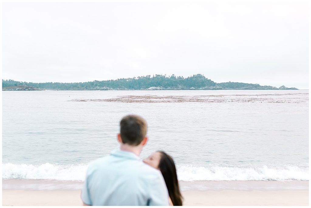 soft focus portrait of the couple overlooking the waves at Carmel by the Sea