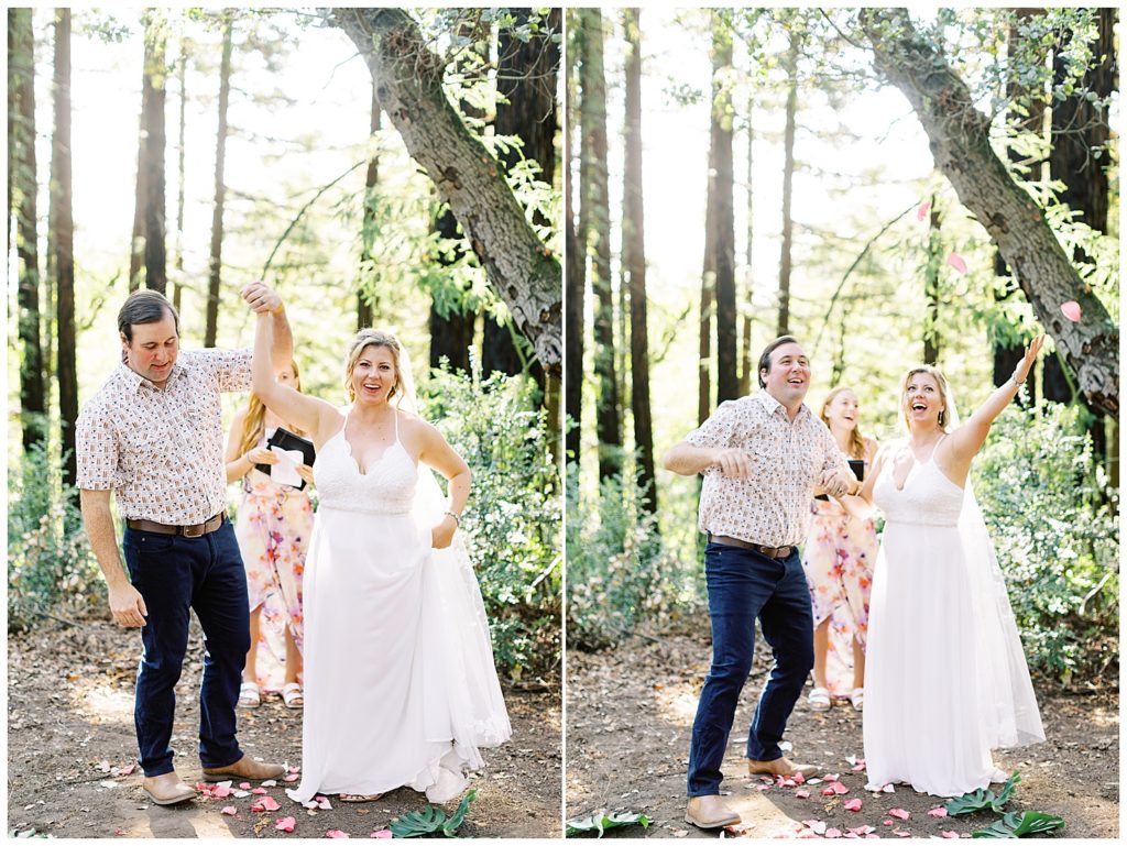 The bride and groom celebrating their wanderlust wedding reception in Oakland's Joaquin Miller Park by throwing pink flower petals into the air by film photographer AGS Photo Art