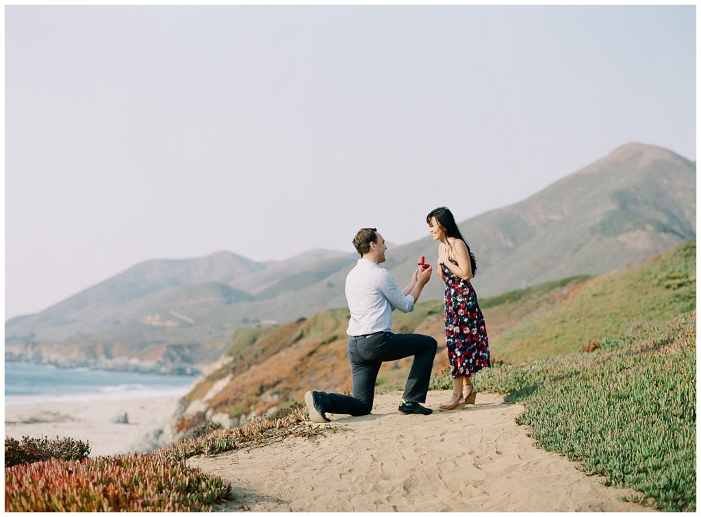 man proposing on one knee to his fiancée in Big Sur, CA by film photographer AGS Photo Art