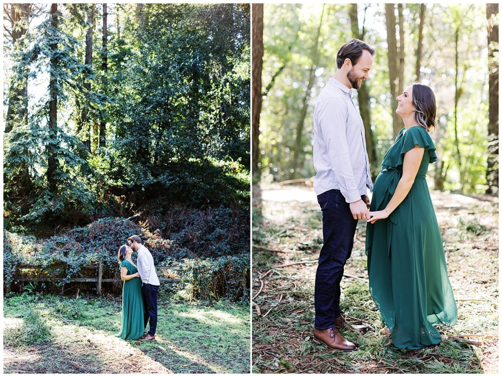 maternity session couple portraits in the forest with light filtering through the trees, the couple is smiling at one another and holding hands