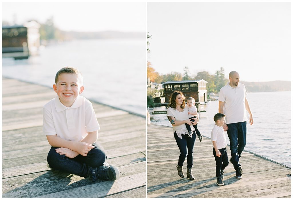 family portrait of oldest son at Lake Mohawk on the docks, smiling at the camera; portrait of the family walking down the docks by film photographer AGS Photo Art