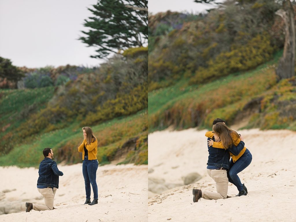 Carmel by the Sea surprise proposal portraits of the couple on the sand, first while the man is on one knee proposing, the second of the couple hugging