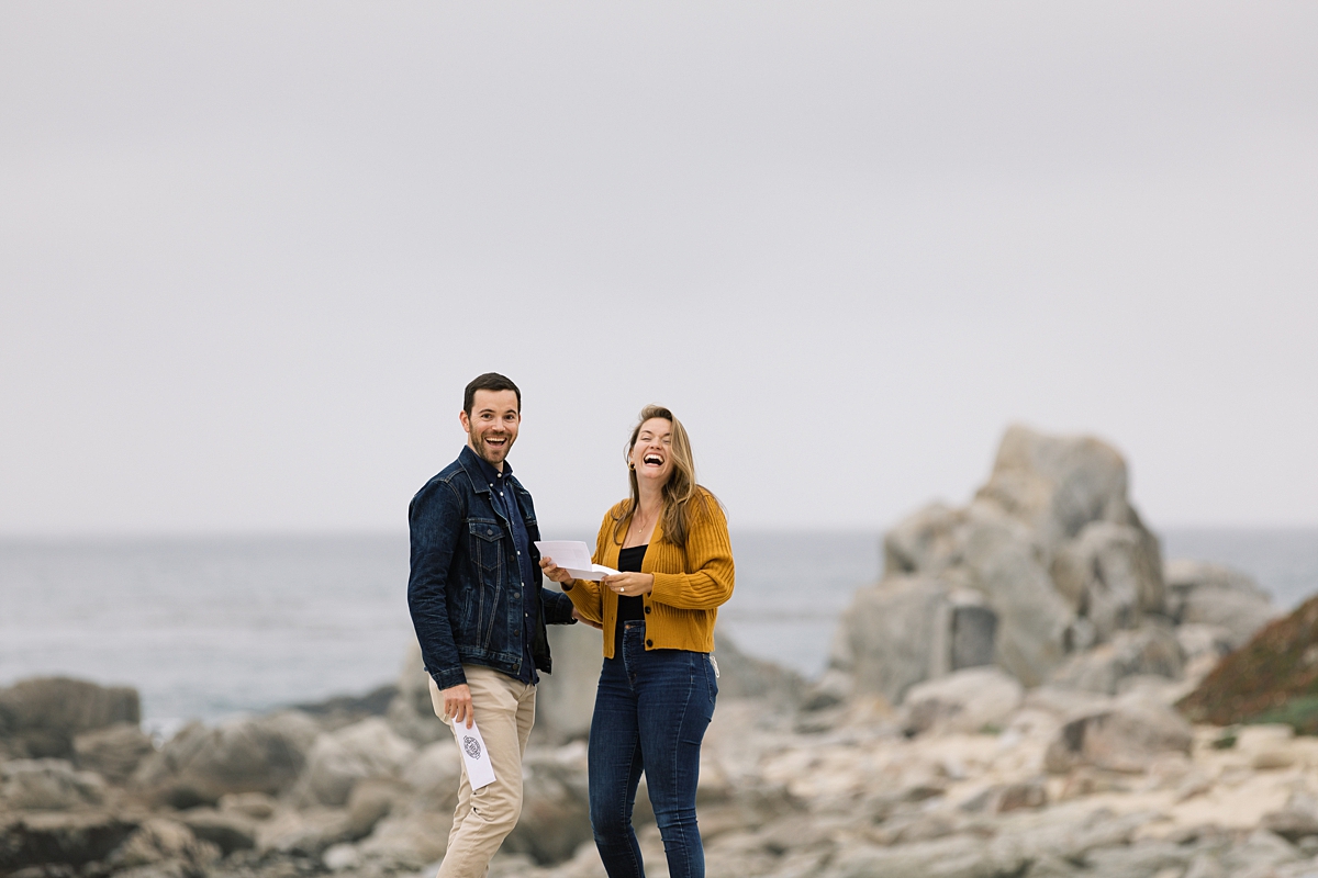 couple smiling at the camera with success and surprise over their Carmel by the Sea surprise proposal