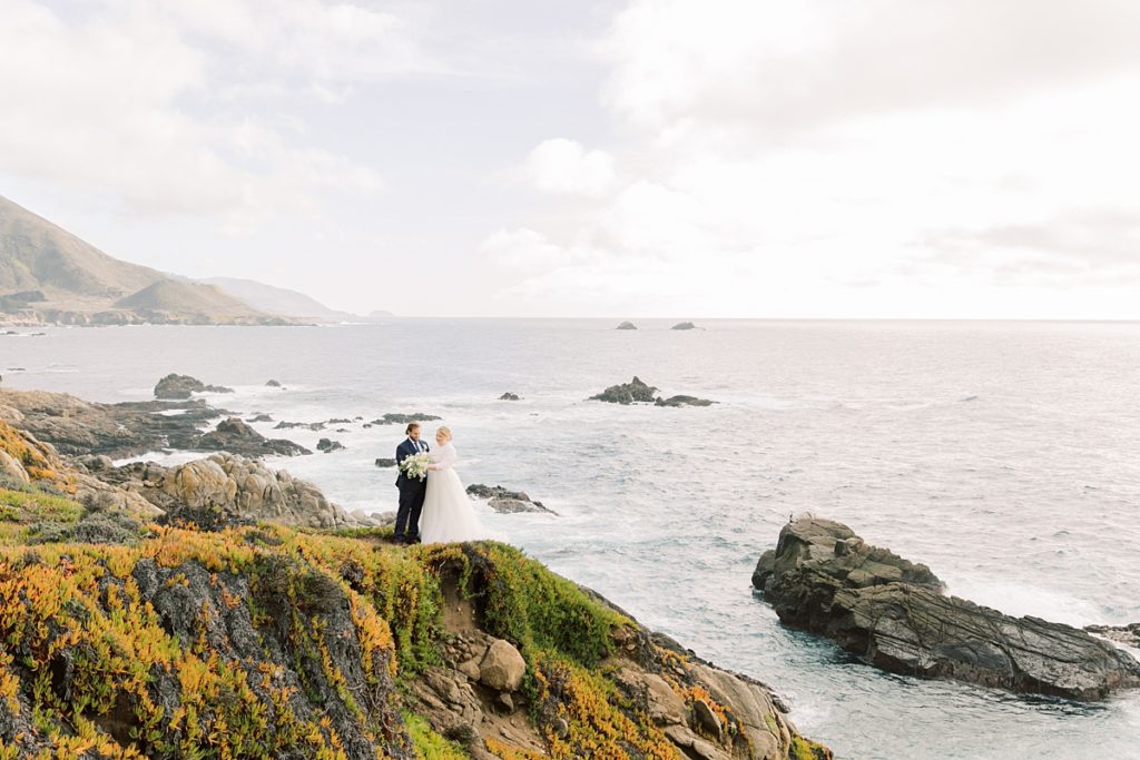 landscape portrait of Pebble Beach elopement overlooking the ocean from the cliffs by film photographer AGS Photo Art