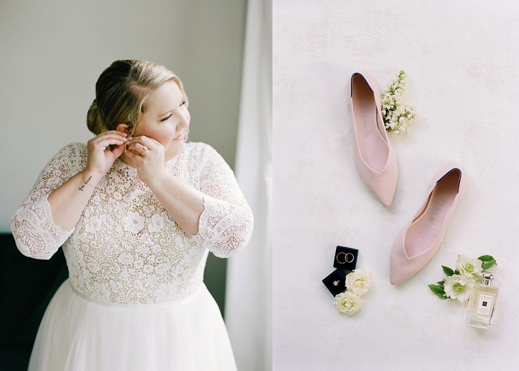 bride getting ready for her first look by putting on earrings; wedding shoes by Rothy's surrounded by white flowers, a cologne bottle, and the rings in a blue box