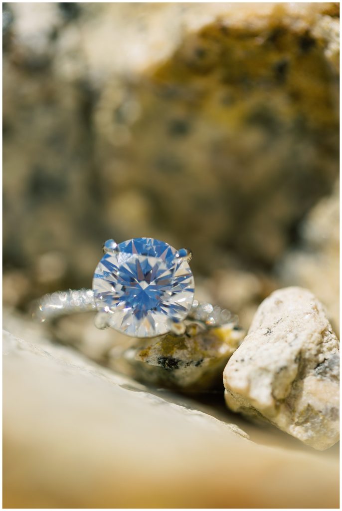 Big Sur Surprise Proposal ring in between rocks by film photographer AGS Photo Art