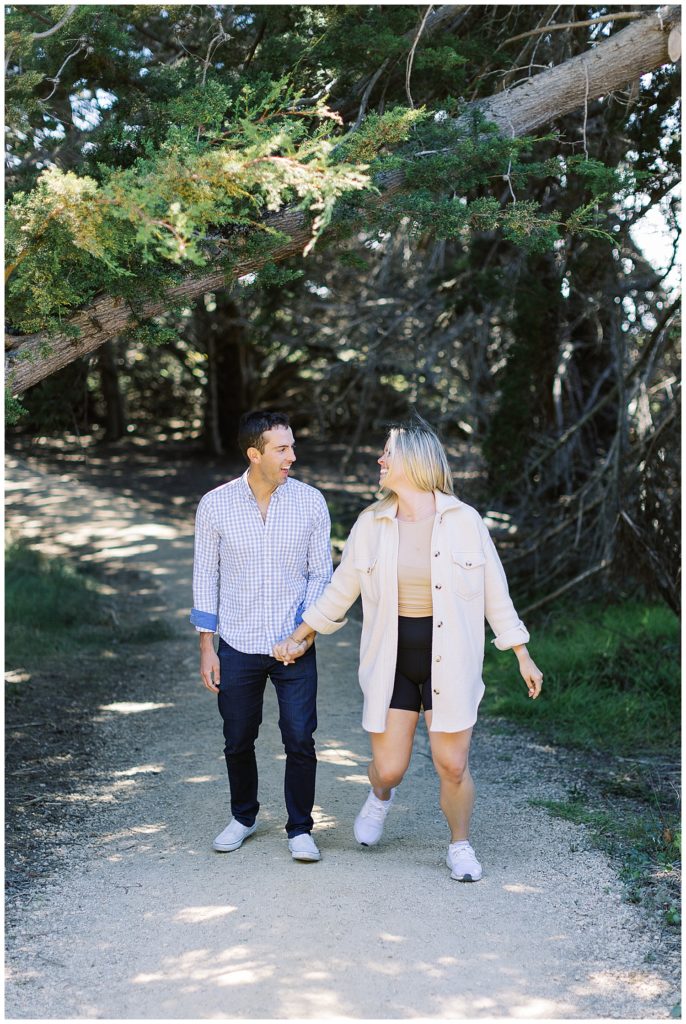 couple during their Big Sur surprise proposal session under shady trees