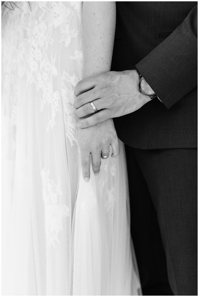 black and white wedding photograph of the bride and groom's ring hands by film photographer AGS Photo Art