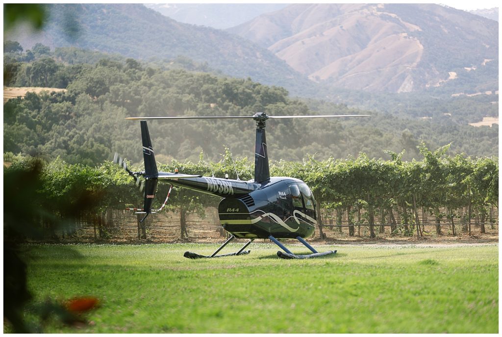 helicopter touching down at Joullian Winery in Carmel Valley