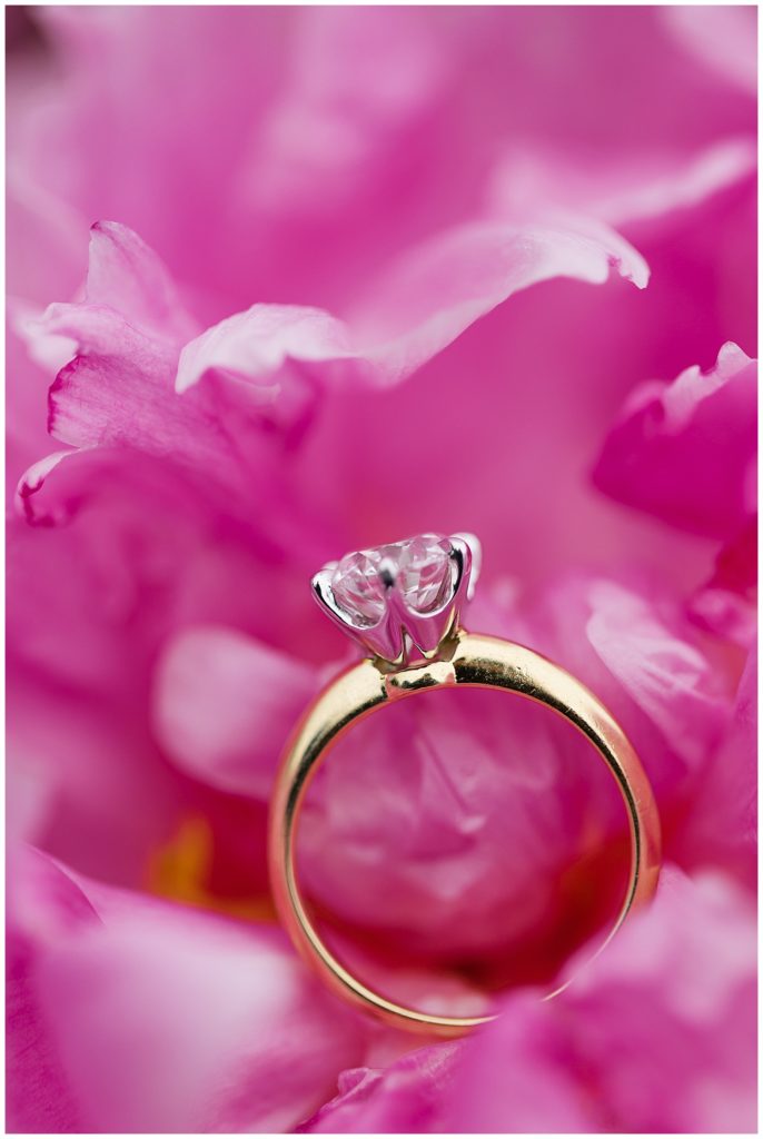 photo of Big Sur engagement ring in a pink peony flower
