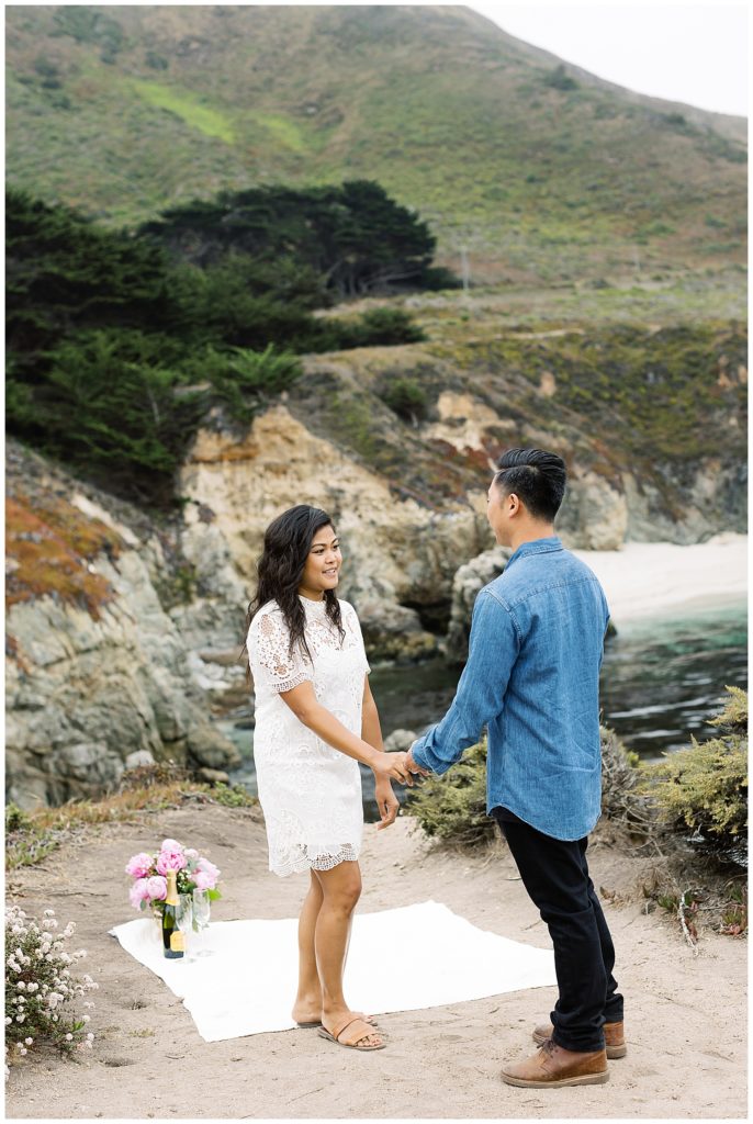 portrait couple hand in hand and smiling at each other by film photographer AGS Photo Art