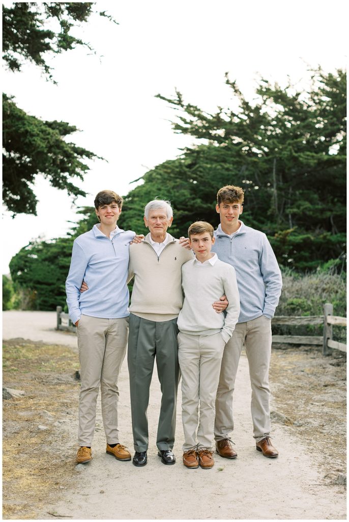 portrait of grandfather and his grandchildren at the MPCC Beach House