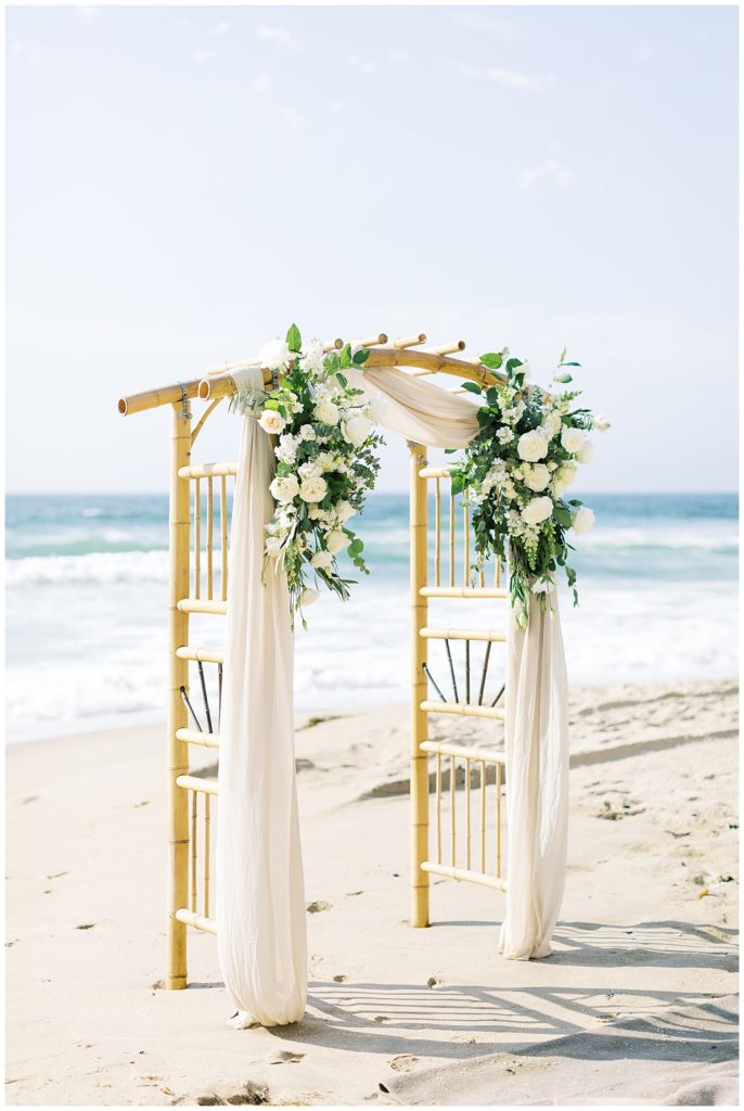 wedding archway on the beach at Monterey