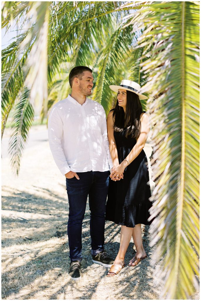 photo of couple under the palm trees in Sonoma by film photographer AGS Photo Art