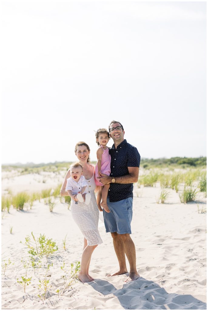 Mom and Dad with their son and daughter for their Cape May family session