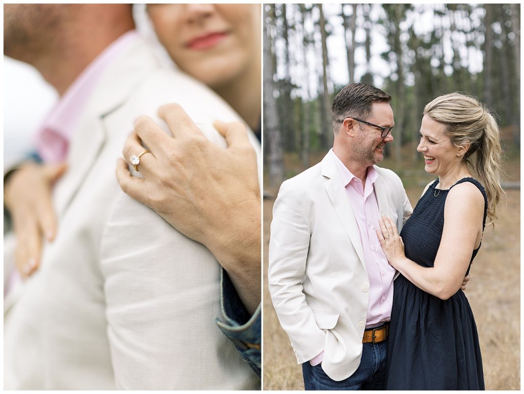 smiling couple portraits at Pebble Beach with a focus on the bride-to-be's engagement ring as she rests her hand on her fiancé's shoulder