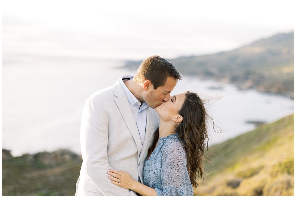 landscape photo of couple sharing a kiss during their engagement session in Big Sur by film photographer AGS Photo Art